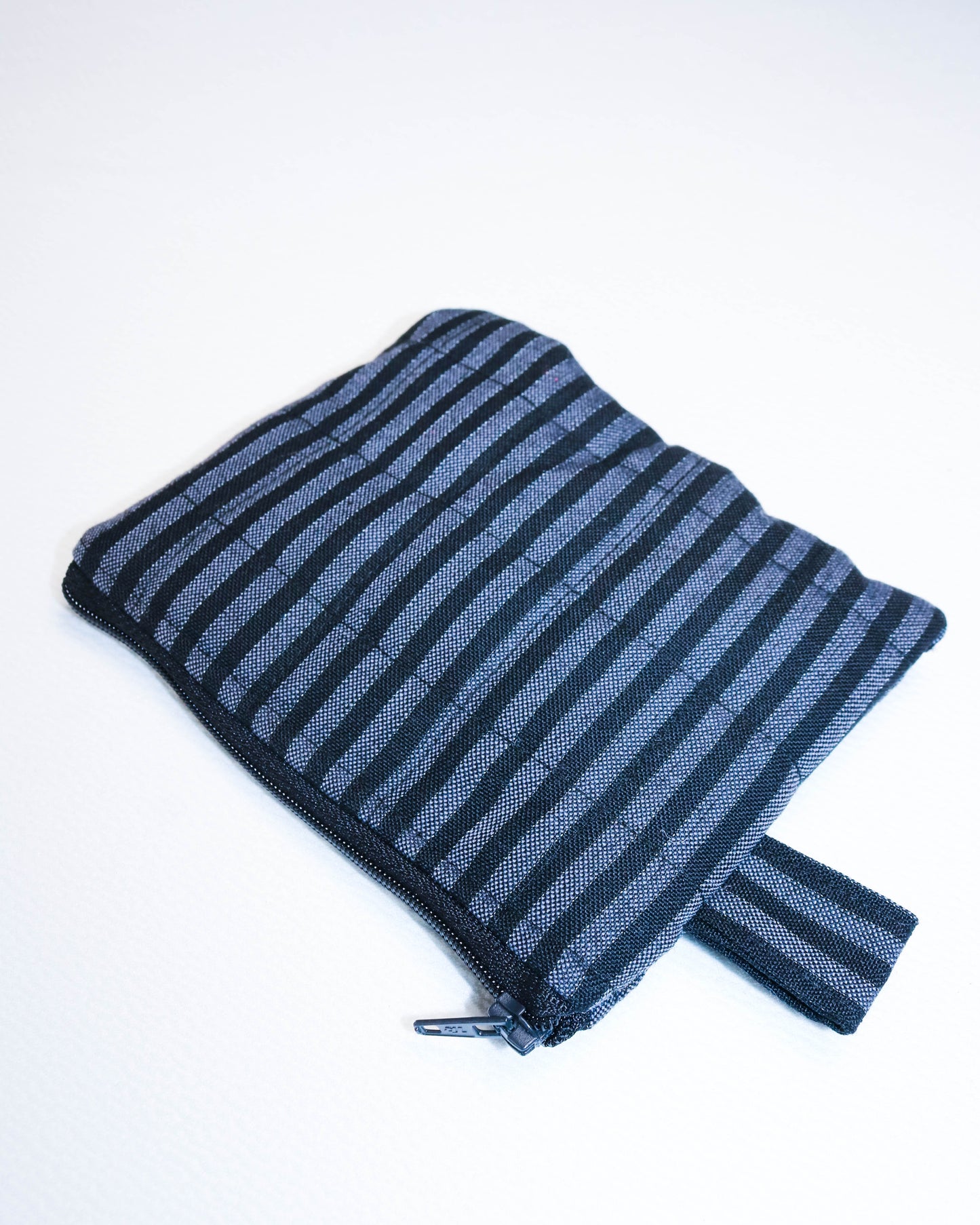 Purse in black and grey stripes
