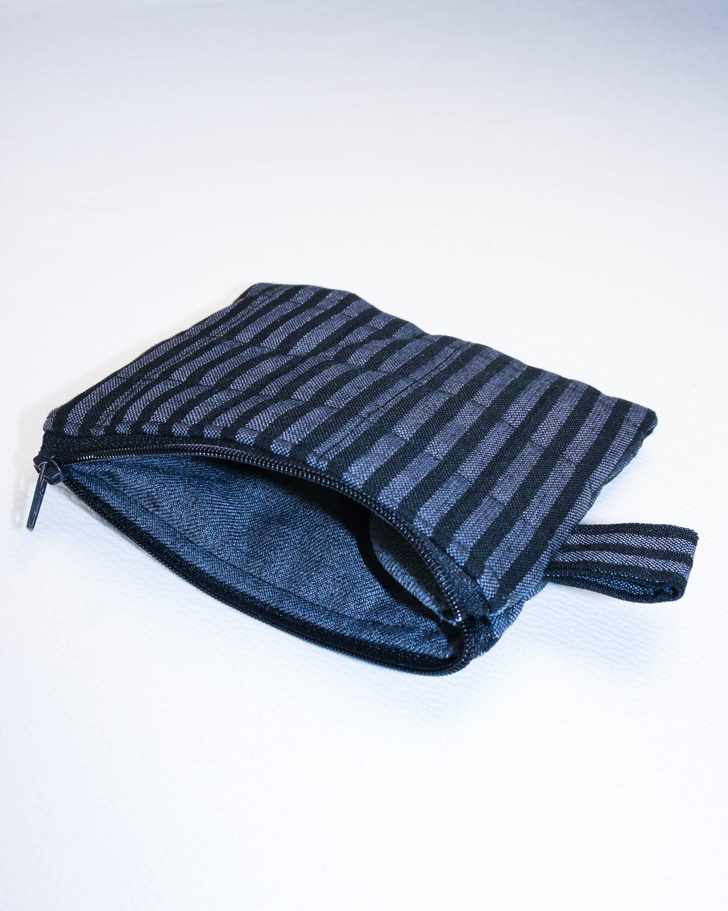 Purse in black and grey stripes