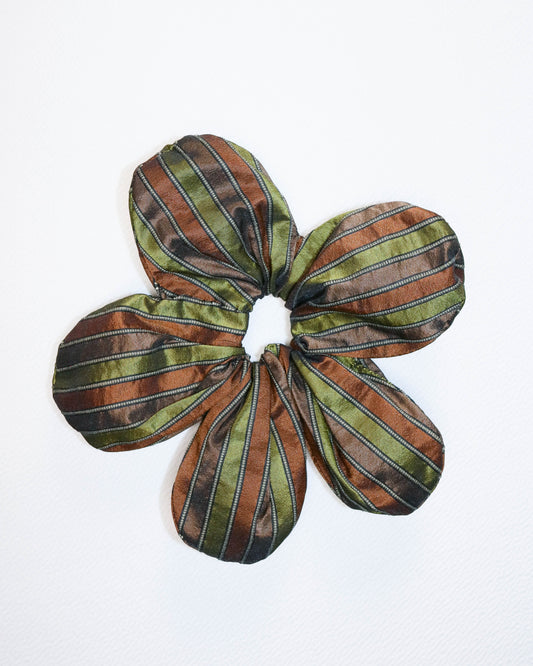 Striped flower-shaped object on a white background