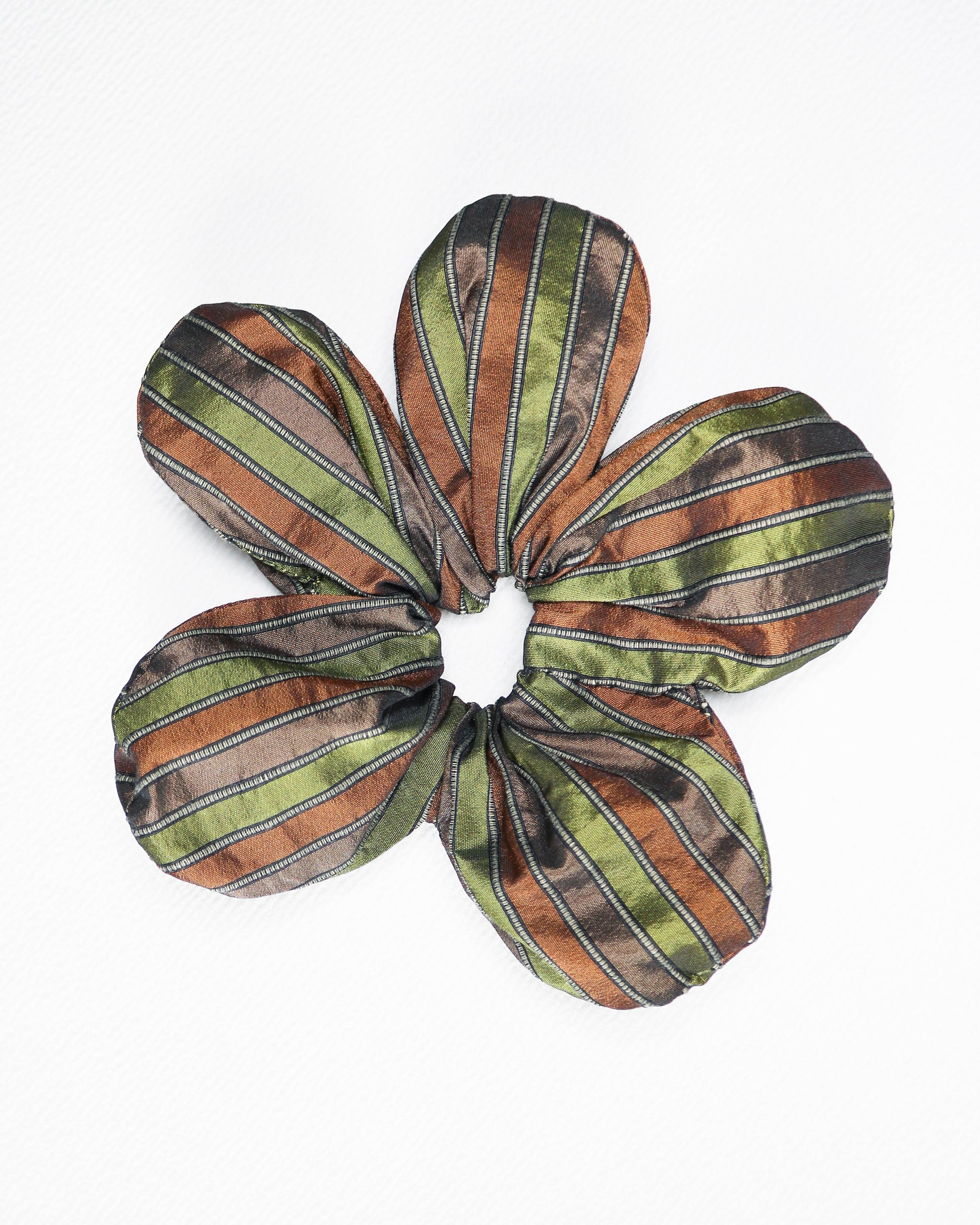 Floral-patterned scrunchie with green, brown, and beige stripes on a white background
