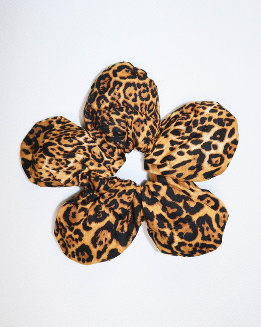 Leopard print scrunchie on a white background