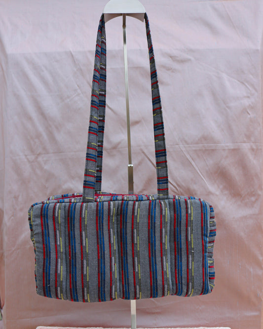 Grey retro print quilted bowler bag