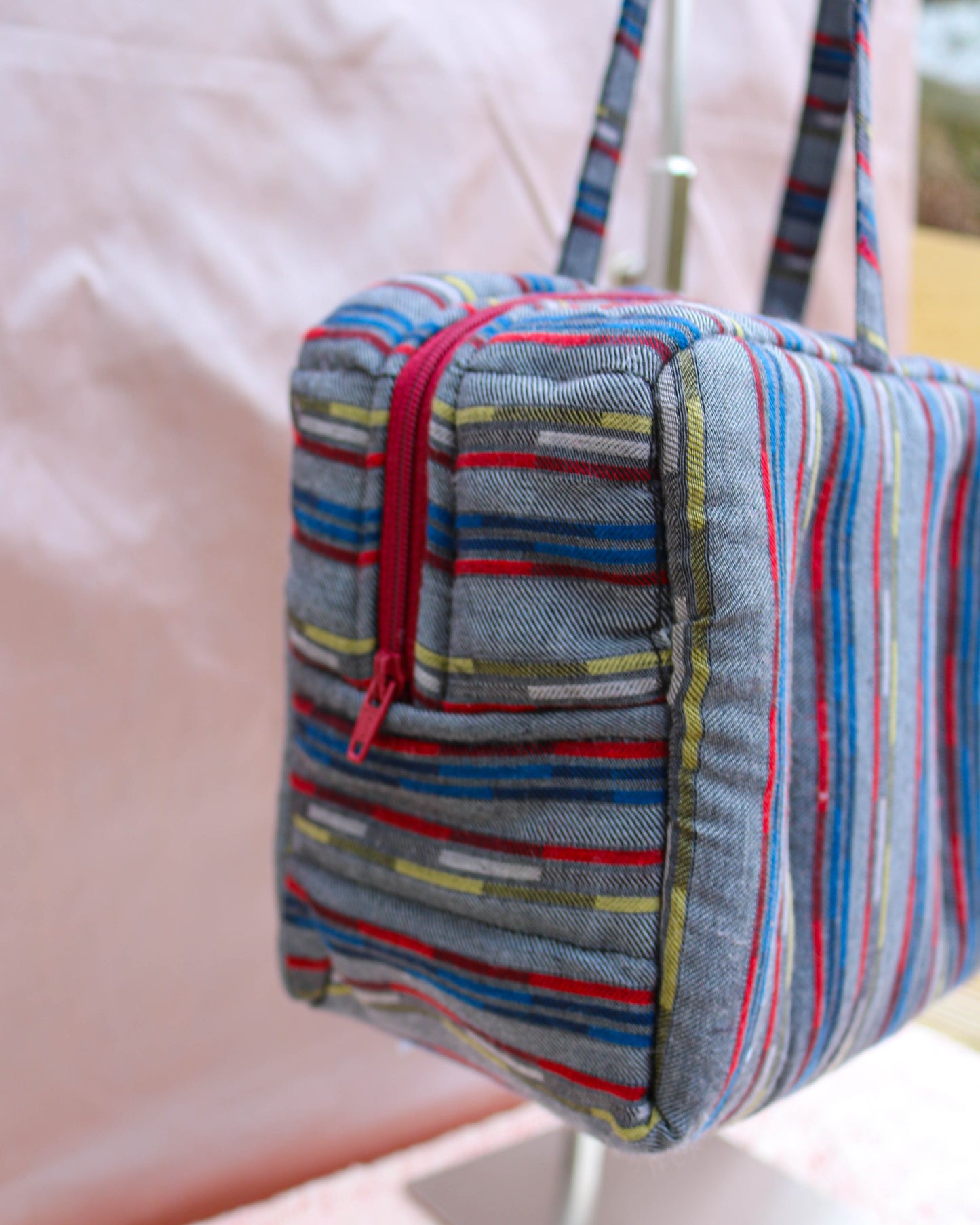 Grey retro print quilted bowler bag