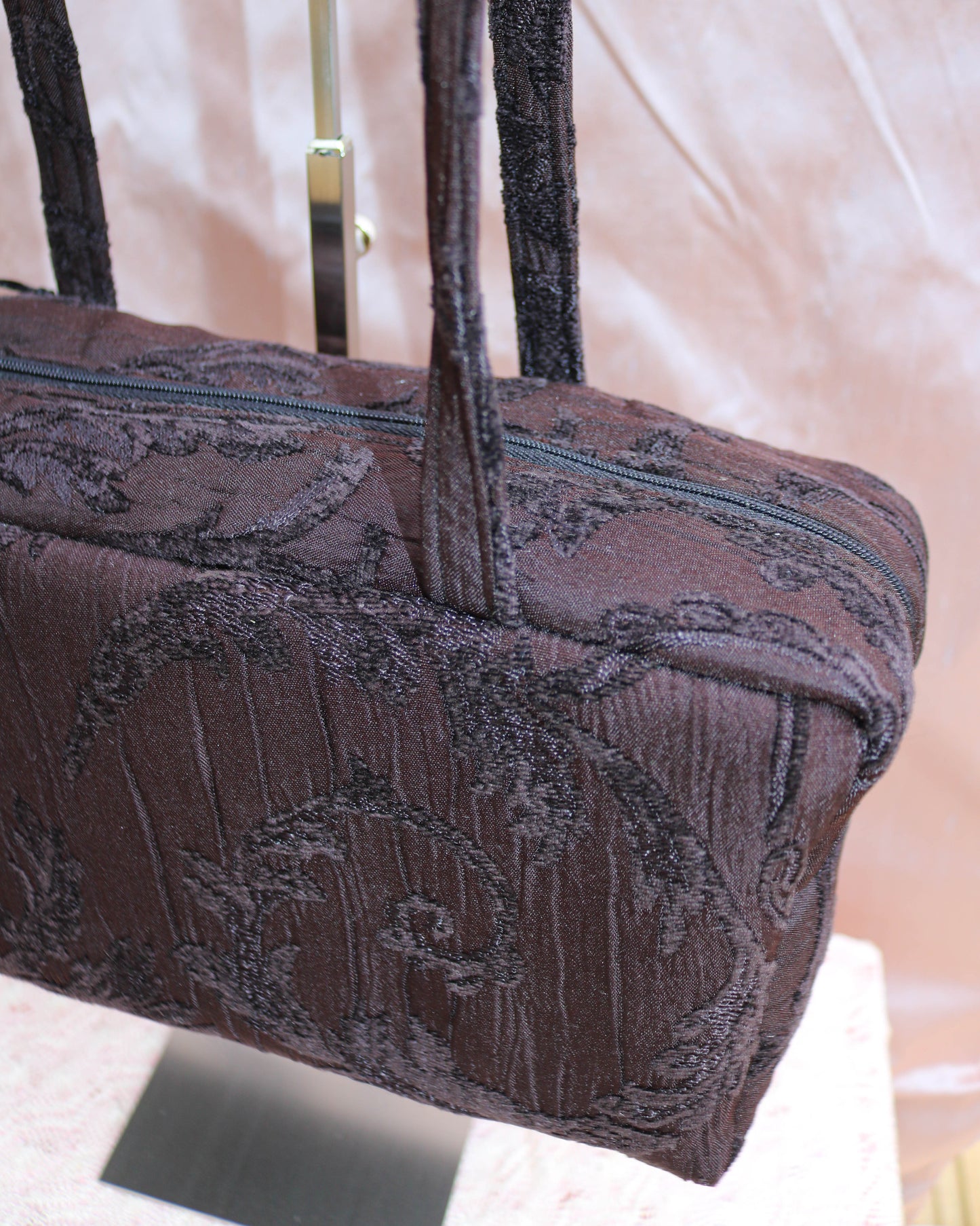 Black textured quilted bowler bag